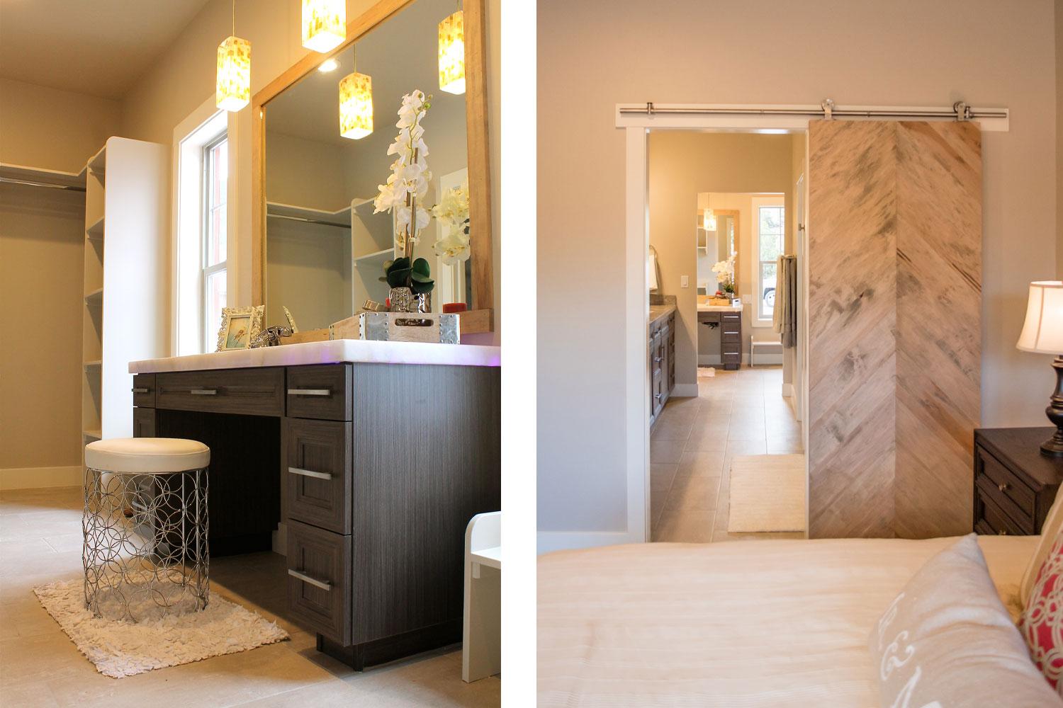 vanity with overhanging yellow and brown glass lights and small stool with white cushion