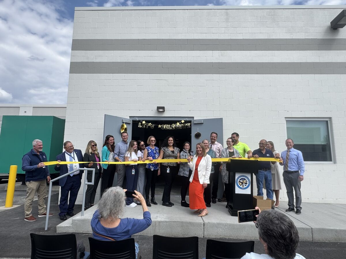 Colorado Bureau of Investigation Toxicology Laboratory building with a ribbon display at the main entrance.