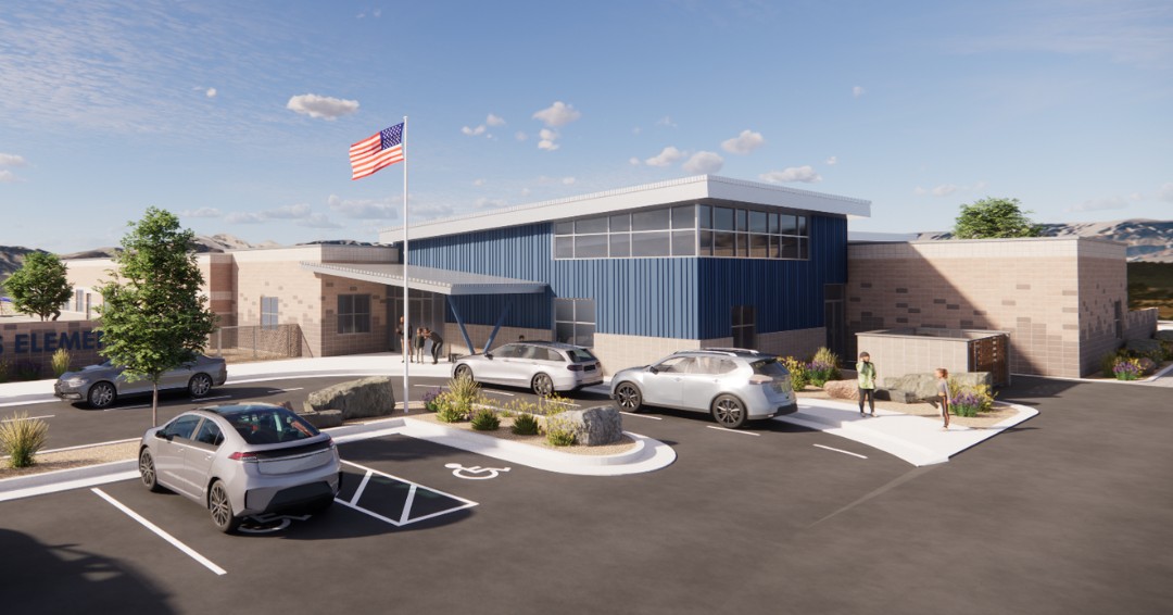 Exterior rendering of a school entrance with a metal‑panel façade, brick base, large windows, covered drop‑off canopy, accessible parking space, flagpole, landscaped plantings, and adjacent parking area under a partly cloudy sky.