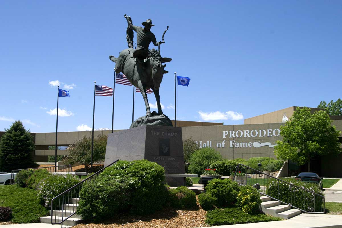 Entrance to the Pro Rodeo Hall of Fame and the statue of Casey Tibbs