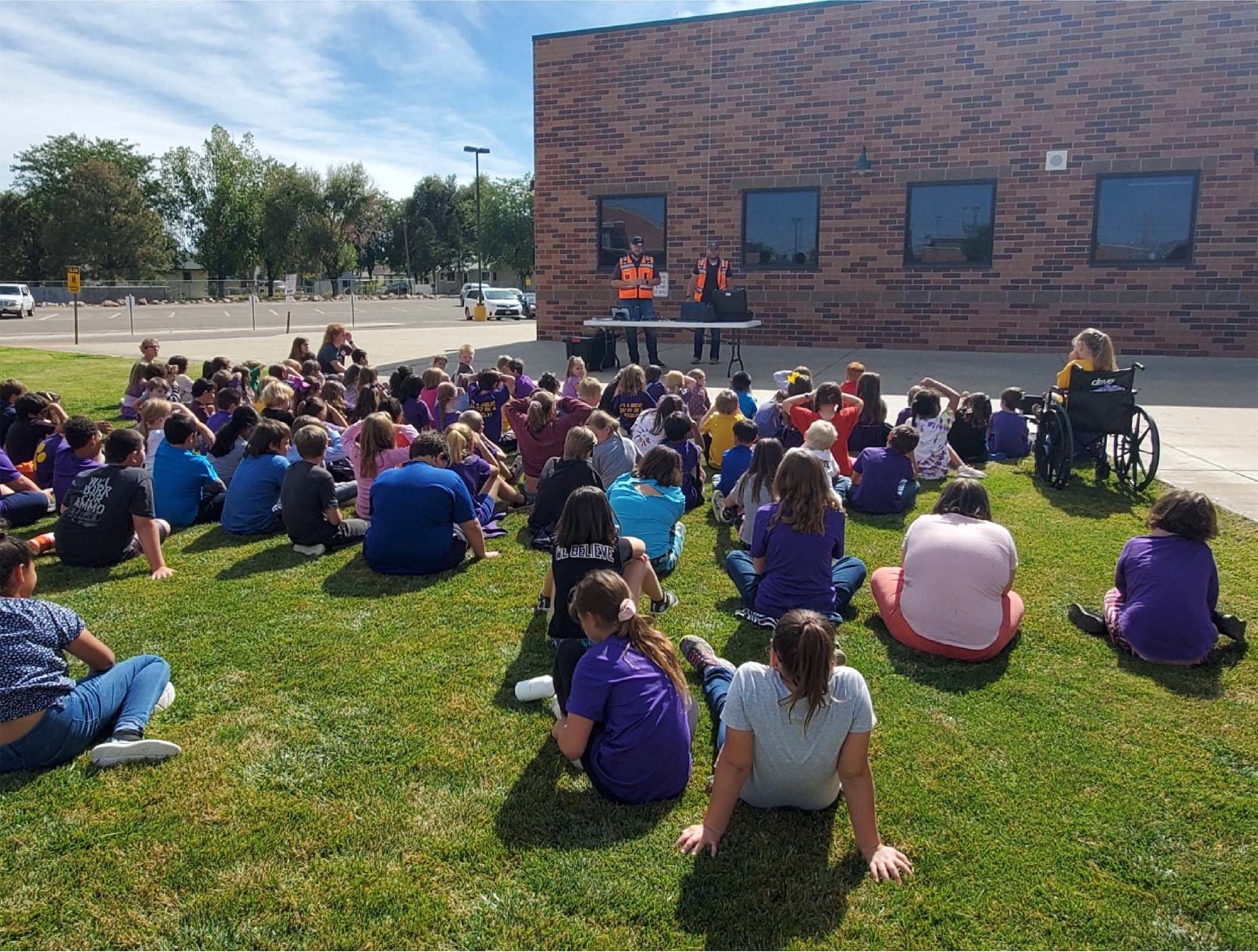 two RTA staff members give a presentation to a group of students