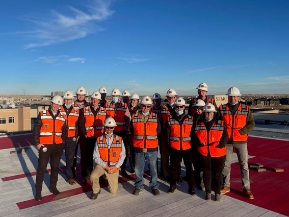 rta staff pose for a photo on the helipad of St. Francis Hospital