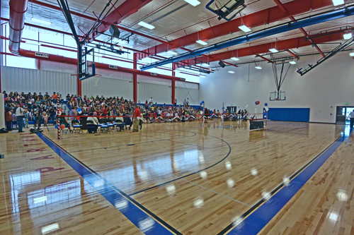 swallows gym filled with people in celebration of the grand opening