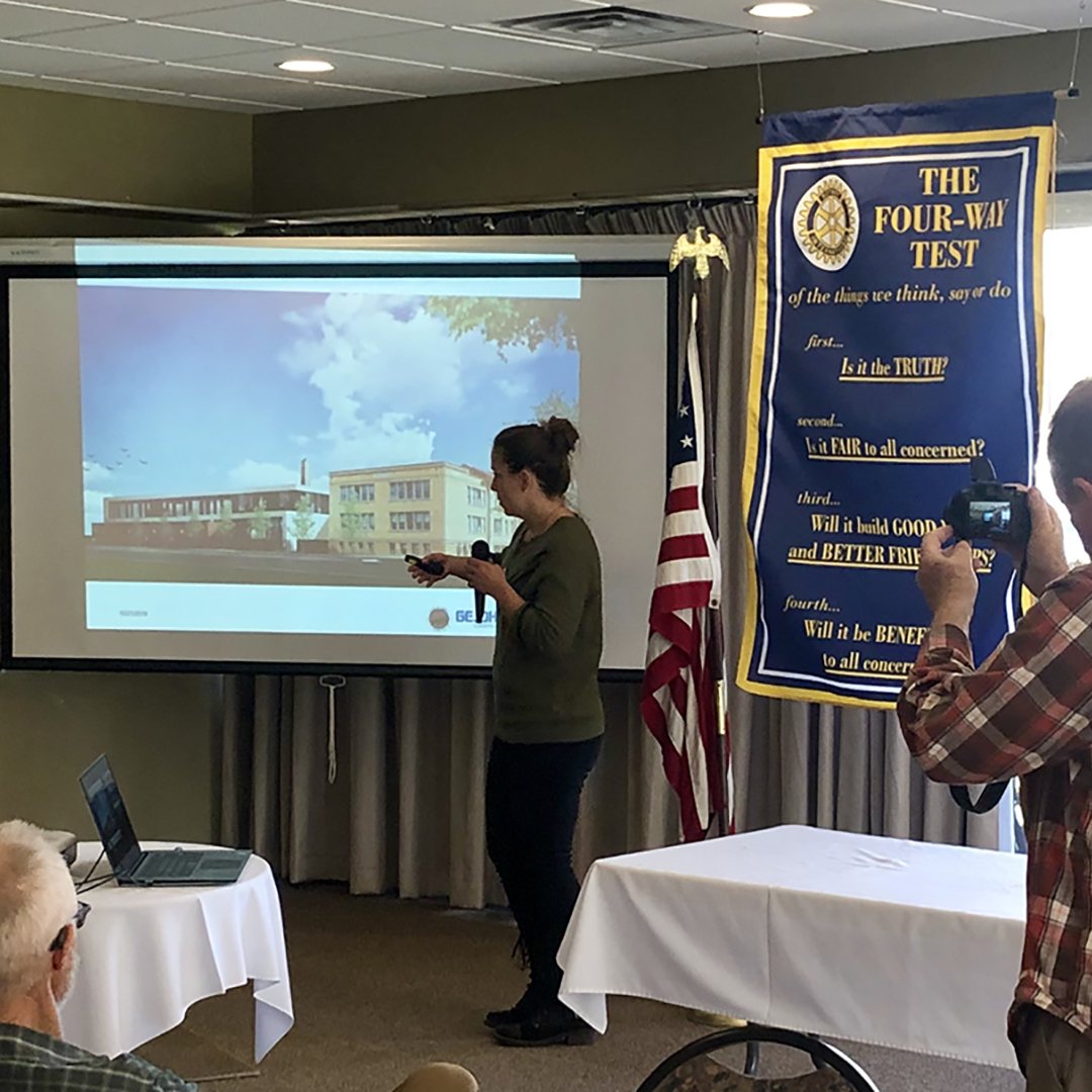 chistine giving a presentation to the rotary club