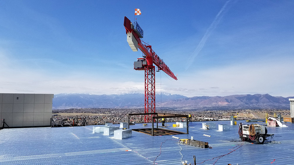 final beam being lowered into place for the st. francis expansion